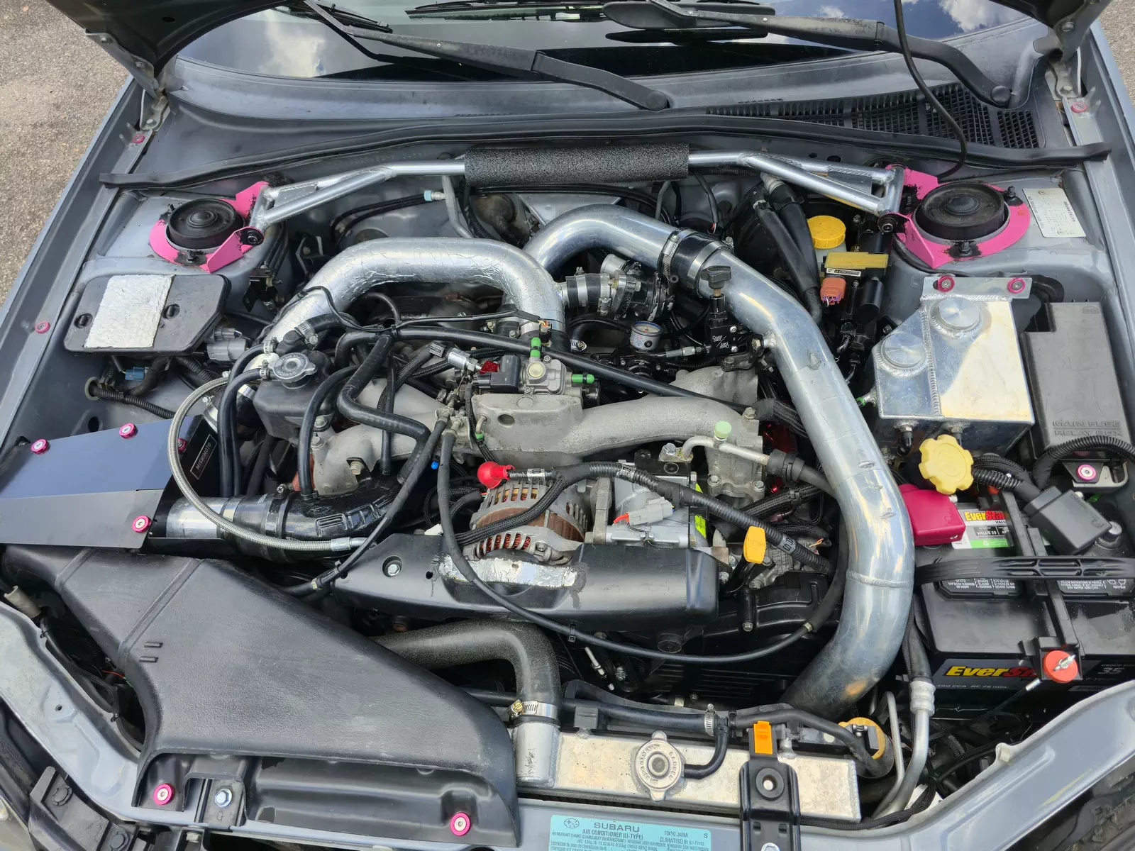 Engine bay showing EJ257/S20V engine with ID1050x injectors and IAG components